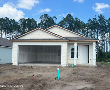 New construction Single-Family house 88 Hulett Woods Road, Palm Coast, FL 32137 - photo 1 1
