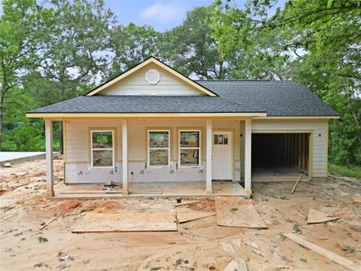 New construction Single-Family house 15169 Austin Road, Willis, TX 77318 - photo 4 4