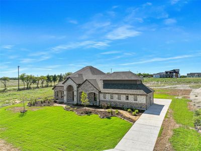 Nestled on a sprawling one-acre lot in the prestigious Gunter ISD!