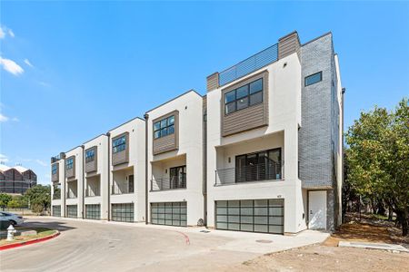 New construction Townhouse house 4060 Spring Valley Road, Unit 402, Farmers Branch, TX 75244 - photo 0