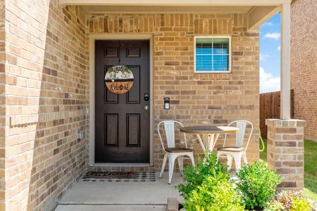 A cozy patio makes a welcoming first impression.