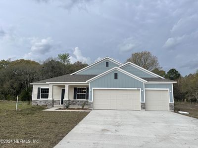 New construction Single-Family house 56422 Creekside Way, Yulee, FL 32097 The Sierra- photo 0 0