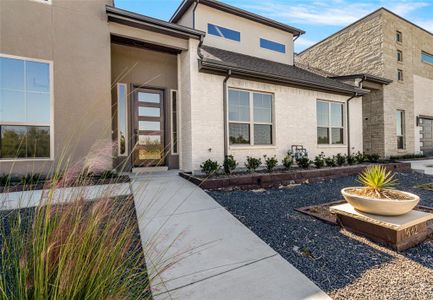 Property entrance with a patio area