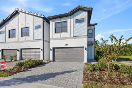 New construction Townhouse house 10251 Ebb Tide Lane, Orlando, FL 32821 - photo 0