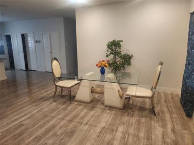 Dining area featuring wood-type flooring