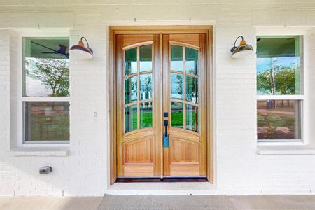 Property entrance with french doors