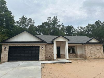 New construction Single-Family house 1035 Weisinger Drive, Magnolia, TX 77354 - photo 0 0