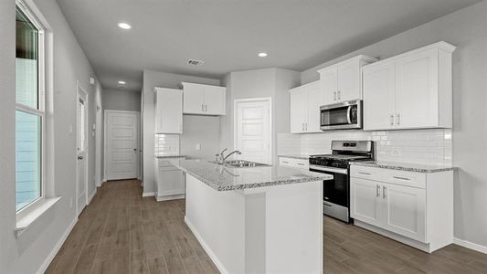 Kitchen - All Home and community information, including pricing, included features, terms, availability and amenities, are subject to change at any time without notice or obligation. All Drawings, pictures, photographs, video, square footages, floor plans, elevations, features, colors and sizes are approximate for illustration purposes only and will vary from the homes as built.