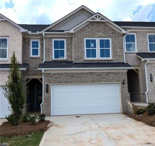 New construction Townhouse house 875 Pensive Run, Dacula, GA 30019 - photo 0