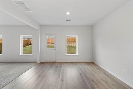 Dining room with light wood-style flooring