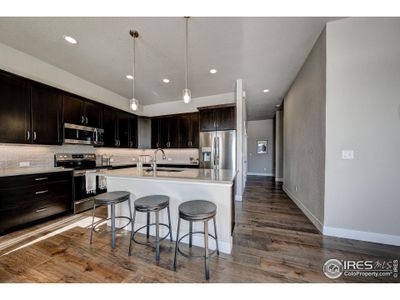 New construction Townhouse house 4167 Trapper Lake Dr, Loveland, CO 80538 - photo 7 7