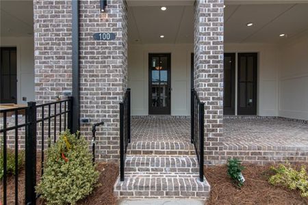 View of terrace , Front Entry with sliding glass doors , and regular door , opens up to an outdoor patio great for entertaining, not the actual unit