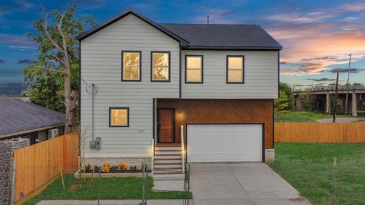 1217 Cabell Street has a lovely elevation featuring an inset wood detail at the garage and entry door! A pocket development, this is one of two homes planned - and the neighborhood has no HOA fees!