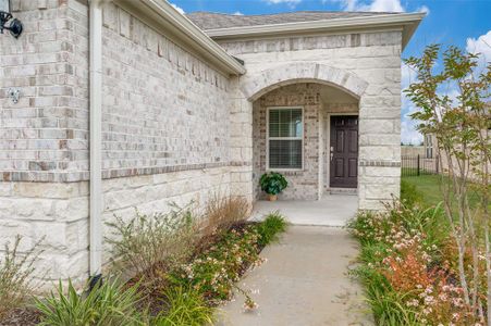 Covered front porch with sitting area