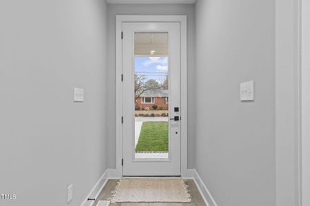 New construction Townhouse house 2325 Sheffield Road, Unit 101, Raleigh, NC 27610 - photo 0