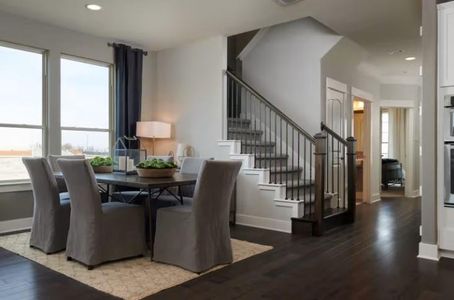 Photo of Pulte model home with same floor plan, not of actual home listed.