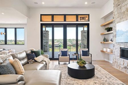 Soaring ceilings provide stature while being warmed by a statement fireplace