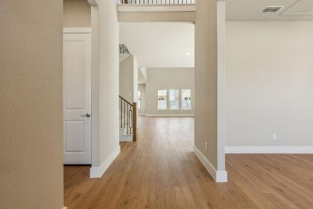 Hall with light wood-type flooring