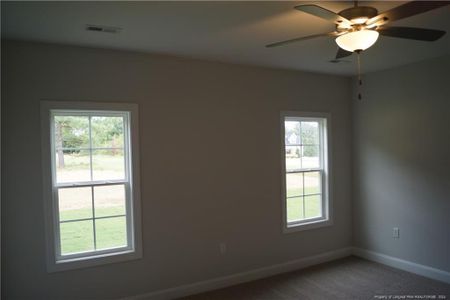 New construction Single-Family house 102 Grinnel Loop, Sanford, NC 27332 - photo 4 4