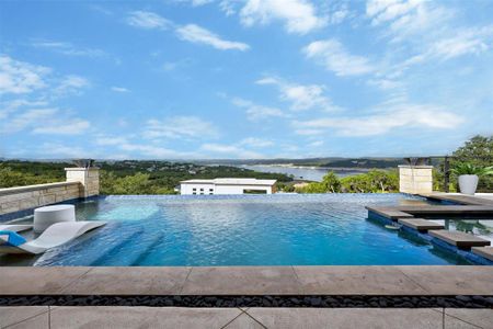 Imagine floating in your own pool with tanning deck, waterfall, fire bowls and magnificent view of Lake Travis.  This part of the lake always has water in it!