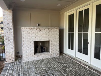 Imagine sitting on this porch in your lounger watching the fireplace!