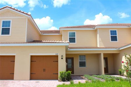 New construction Townhouse house 608 Bay Leaf Drive, Poinciana, FL 34759 Bay- photo 0