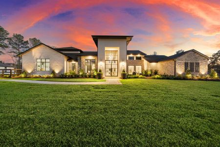 Experience the epitome of luxurious living in this custom home, set on just over 1.1 acres in the highly sought-after equestrian community of Willow Creek Ranch