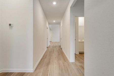 Hall with light wood-type flooring