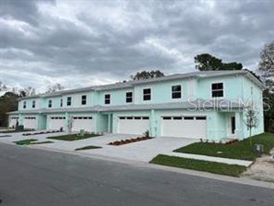 New construction Townhouse house 565 Coronado Cove Road, Unit 005, New Smyrna Beach, FL 32168 - photo 0 0