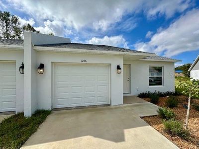 New construction Duplex house 1266 Dosseywood Lane, Lakeland, FL 33811 - photo 0