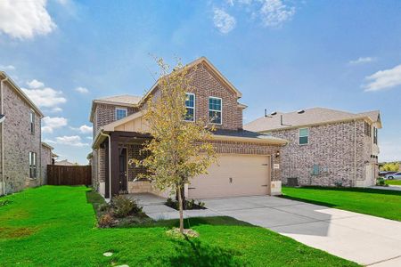 View of front of property with a garage, central air condition unit, and a front lawn