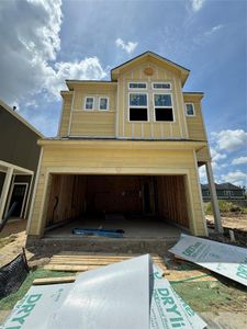 Three-story home with 2 bedrooms, 2 full and 2 half baths, plus 2 car garage