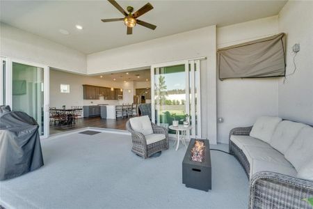 covered patio with corner sliding glass doors