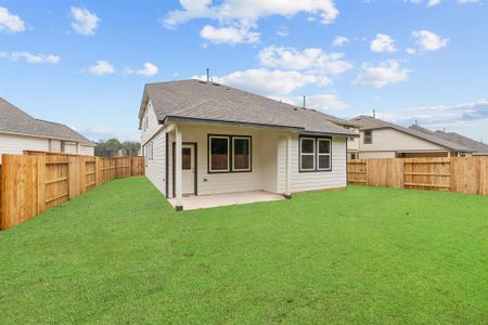 This backyard is perfect for family gatherings, social events, or simply unwinding in the fresh air.