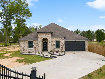 New construction Single-Family house 12475 County Road 3740, Cleveland, TX 77327 - photo 0 0