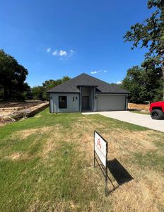 New construction Single-Family house 427 E Munson Street, Denison, TX 75021 - photo 0