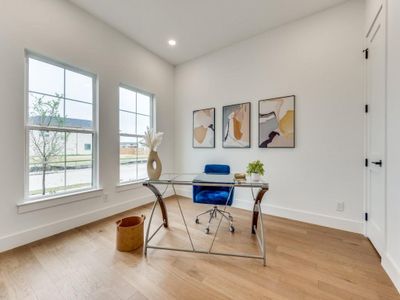 Office space with wood-type flooring