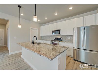 New construction Duplex house 5982 Rendezvous Pkwy, Timnath, CO 80547 Caraway- photo 17 17