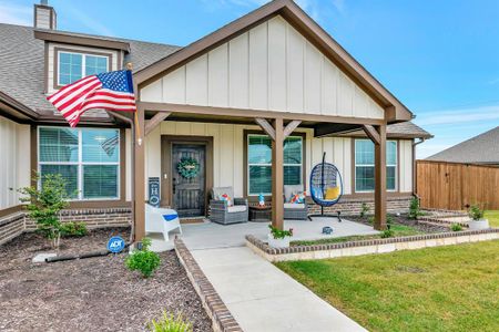 Inviting front porch with lots of area for entertaining