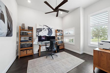 Walk through French doors into this light and bright study.