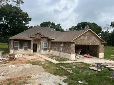 New construction Single-Family house 13948 Wigginsville Road, Conroe, TX 77302 - photo 0 0