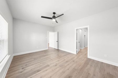 Master Bedroom with LVP flooring.