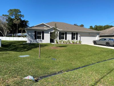 New construction Single-Family house 702 Sw Aster Road, Port Saint Lucie, FL 34953 - photo 1 1
