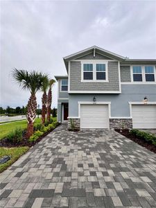 New construction Townhouse house 5640 Brooklet Woods Drive, Wesley Chapel, FL 33545 - photo 0