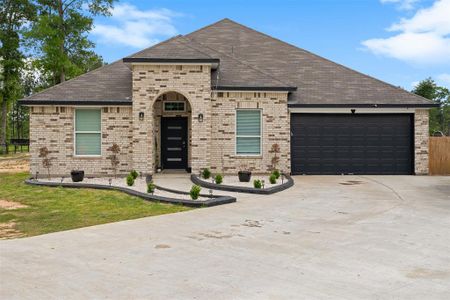 New construction Single-Family house 12475 County Road 3740, Cleveland, TX 77327 - photo 1 1