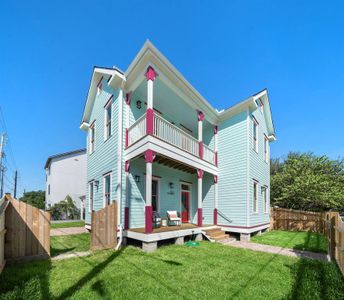 Front porches on the 1st and 2nd floors. Plenty of yard space at front and side of the home - perfect for parties, pets and even a pool!