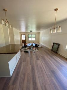 Living room featuring dark hardwood / wood-style flooring