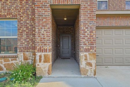 Property entrance with a garage