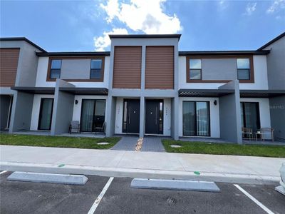 New construction Townhouse house 3444 Tranquil Trail, Kissimmee, FL 34747 - photo 0 0