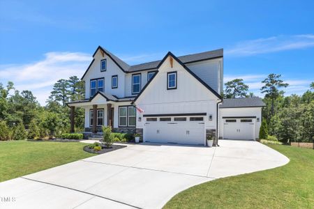 New construction Single-Family house 105 River Ledge Drive, Holly Springs, NC 27540 - photo 4 4